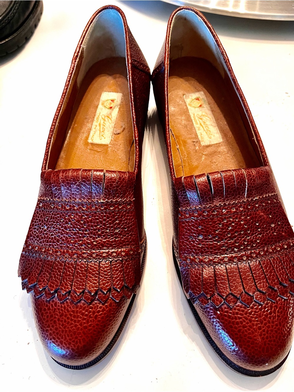 Gucci Men's Burgundy Textured Leather Kiltie Slip-Ons